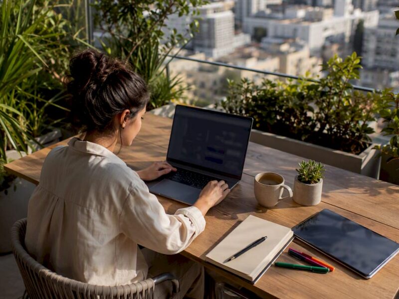 Marketing analyst reviewing ads data dashboard at desk